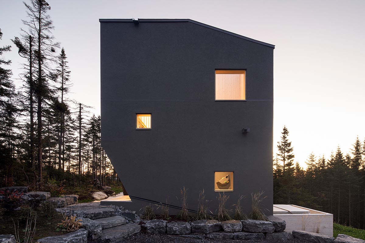 Quinzhee Architecture imagines a rustic retreat like a climbing block in Canada