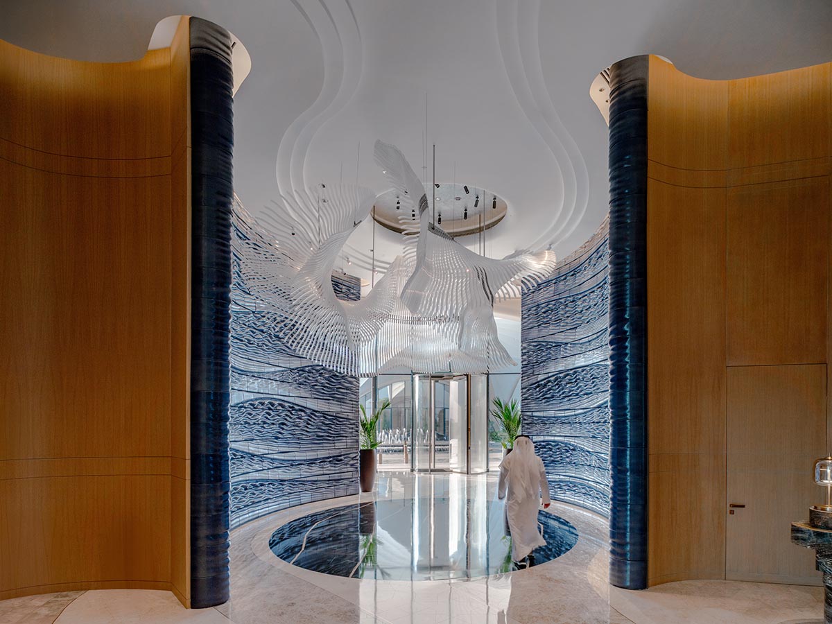 Studio RAP wraps the entrance of a hotel with majestic 3D printed ceramic walls 