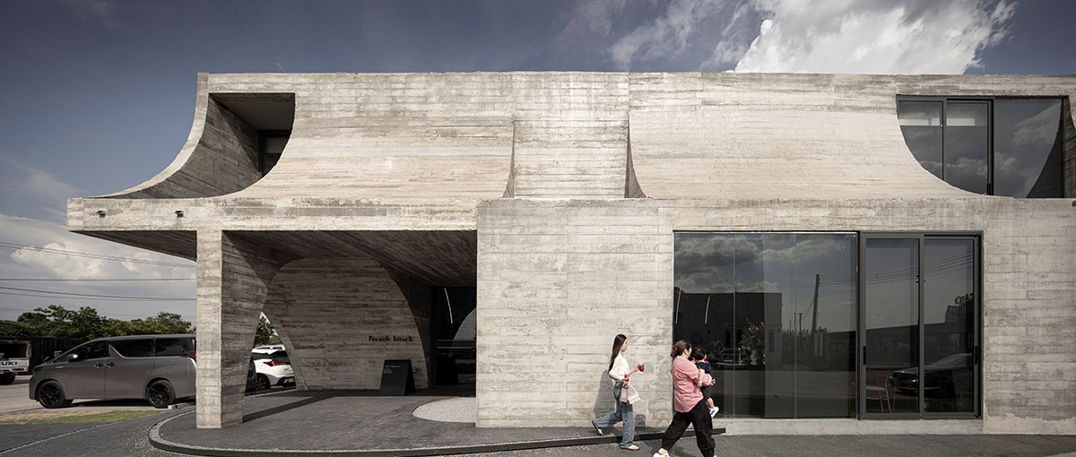 French Kitsch III is a cathedral-like cafe in Thailand that features imperfect arches