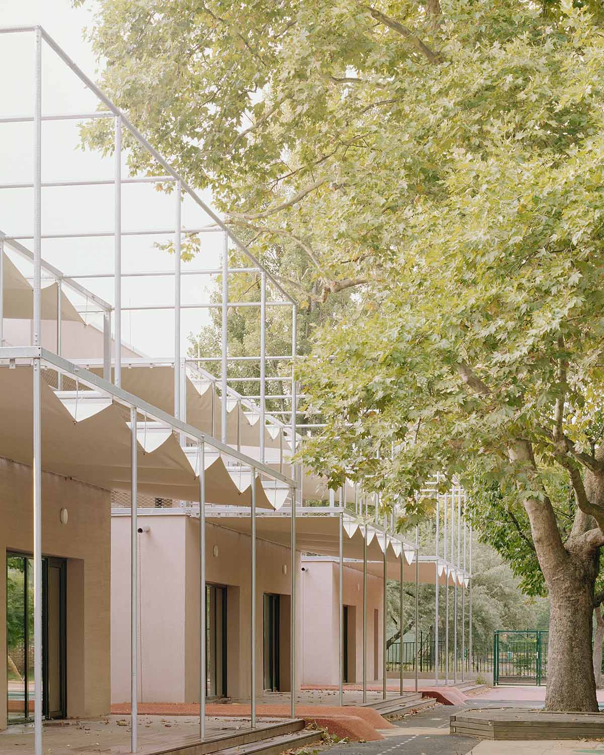 Archikon Architects reimagines Hungarian apartments into a vibrant pink kindergarten