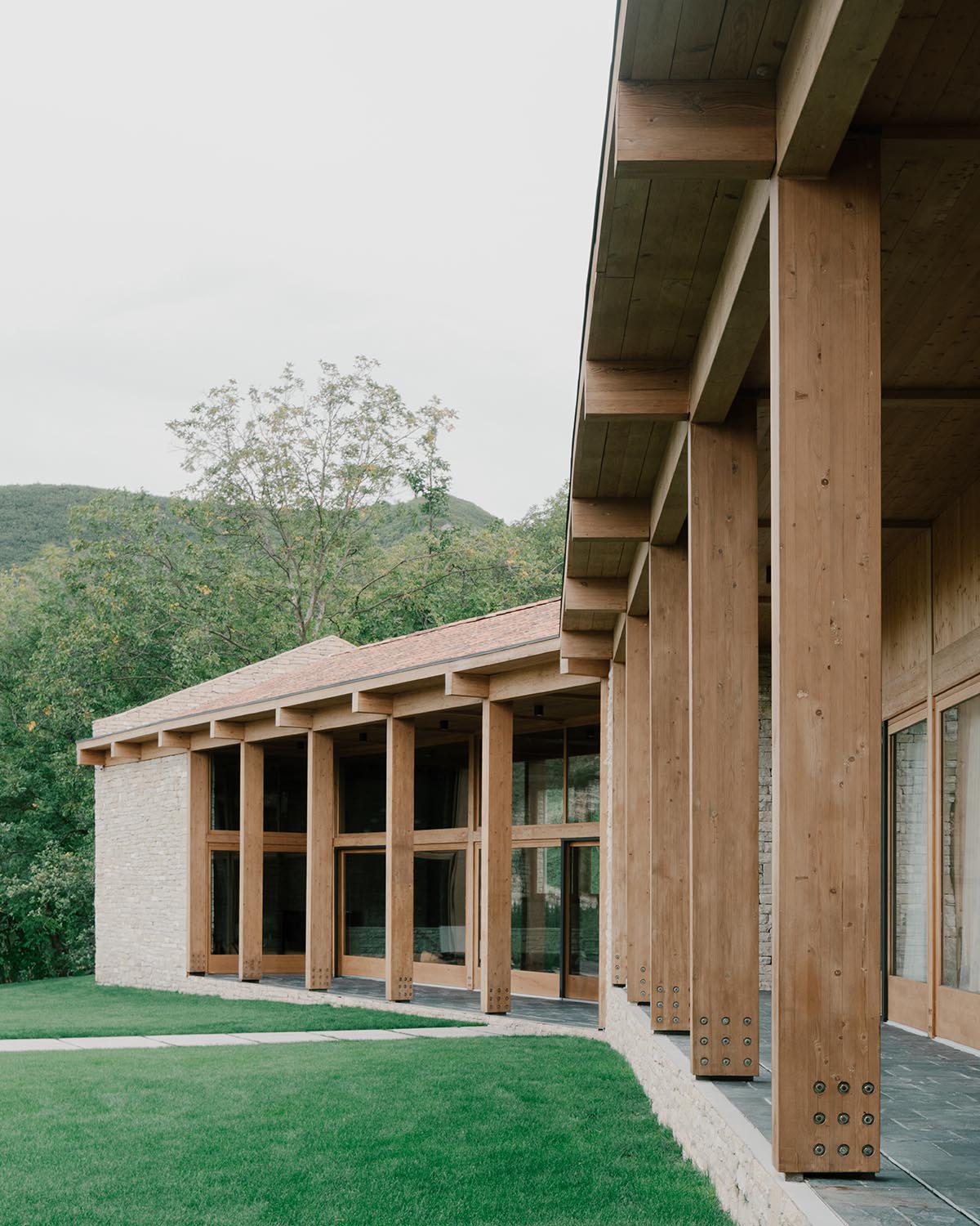 The stone and wood Tbilisi residence integrates architecture with the natural landscape
