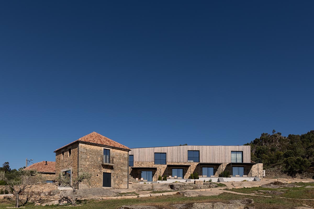 PLATAFORMArq built retreat within tunnel-like stone walls to create 