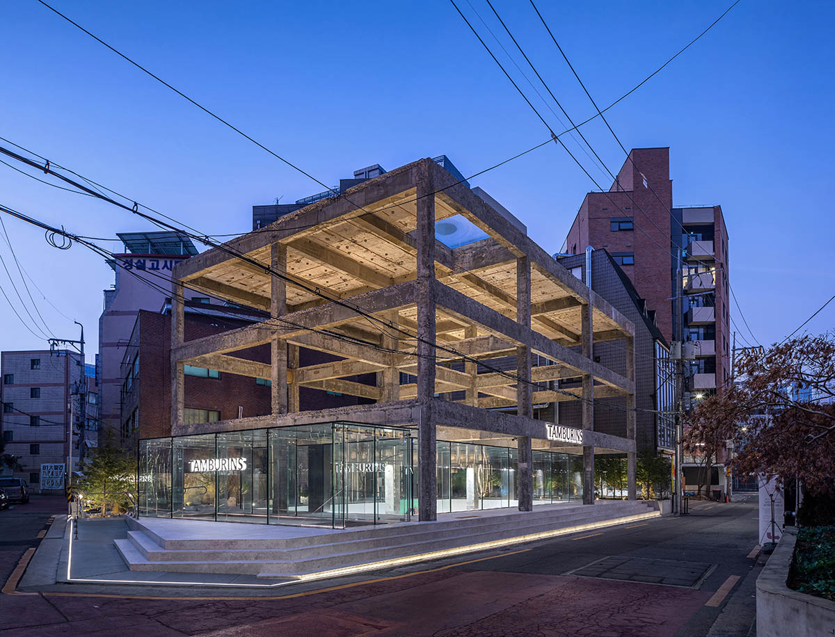 Perfume store by The System Lab shows the beauty of scent with gridded concrete and glass box