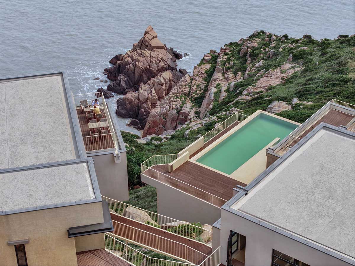 The Lighthouse Hotel reinterprets traditional fishing village settlements on a steep reef in Zhoushan