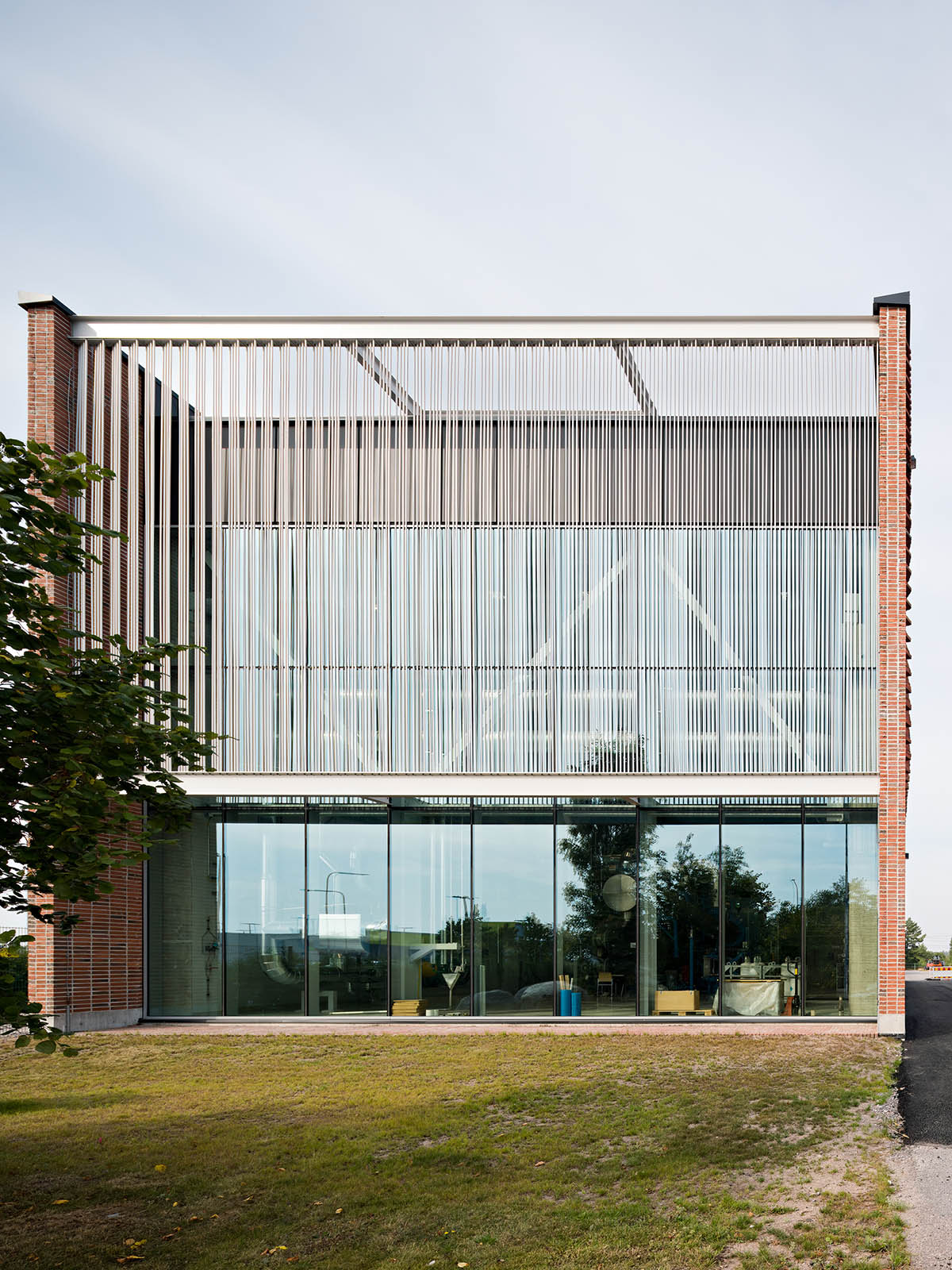 Virkkunen & Co Architects completes heat pump building with longitudinal brick walls in Finland 