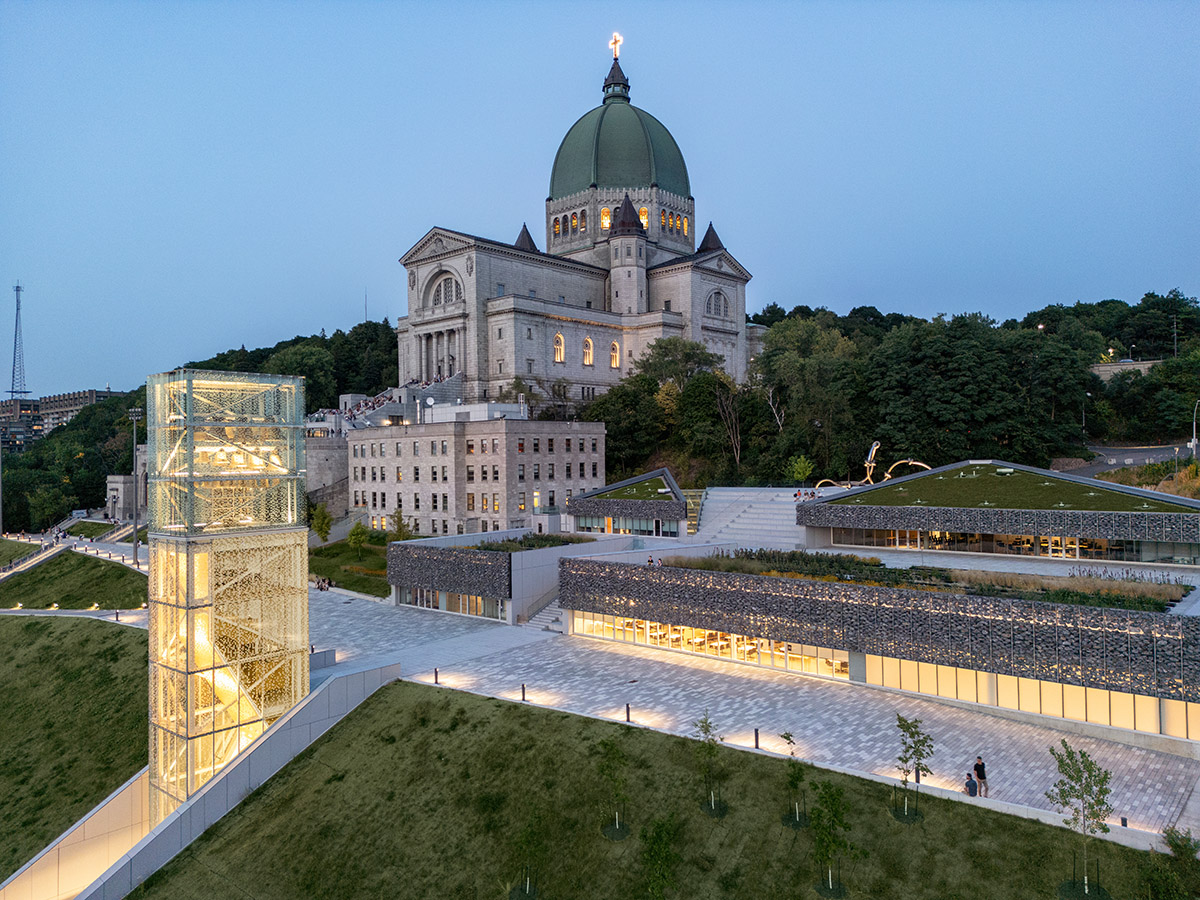 A striking bell tower pierces the sky, illuminating the grandeur of the pavilion in Montreal