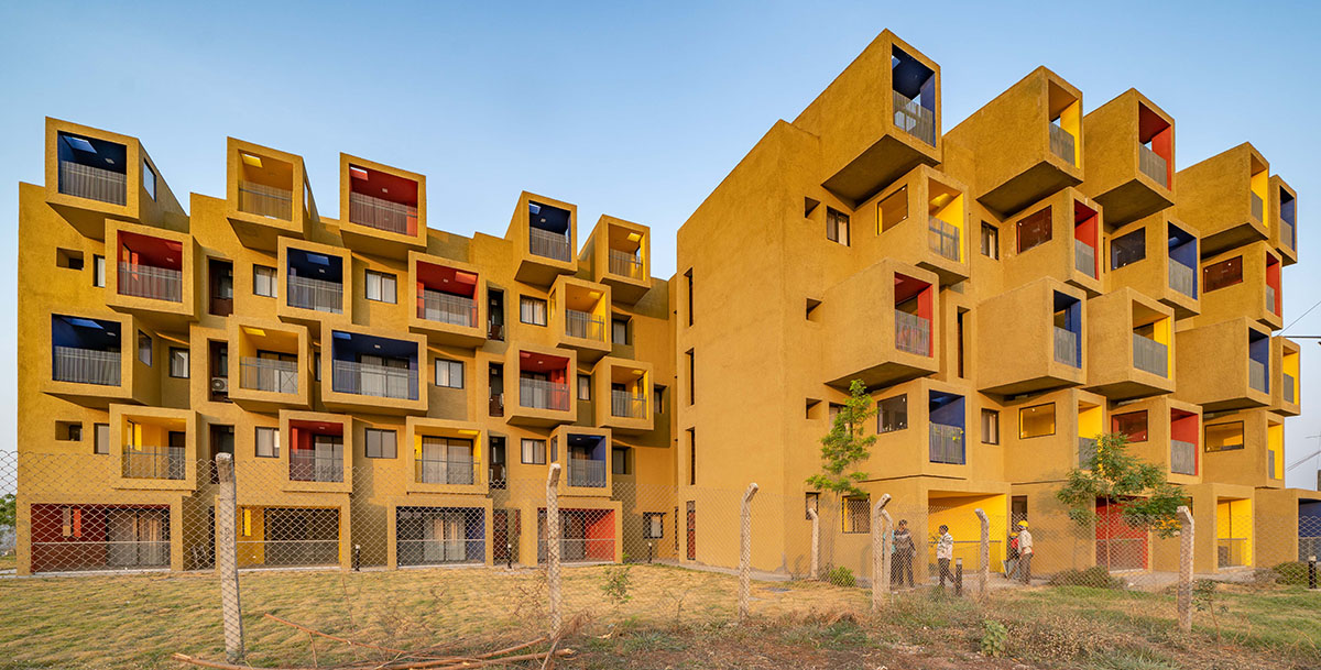 Sanjay Puri Architects designs residential building with colorful cuboid terraces in India