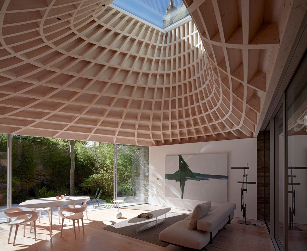 Gianni Botsford Architects transforms dilapidated bungalow with a giant copper clad roof in London