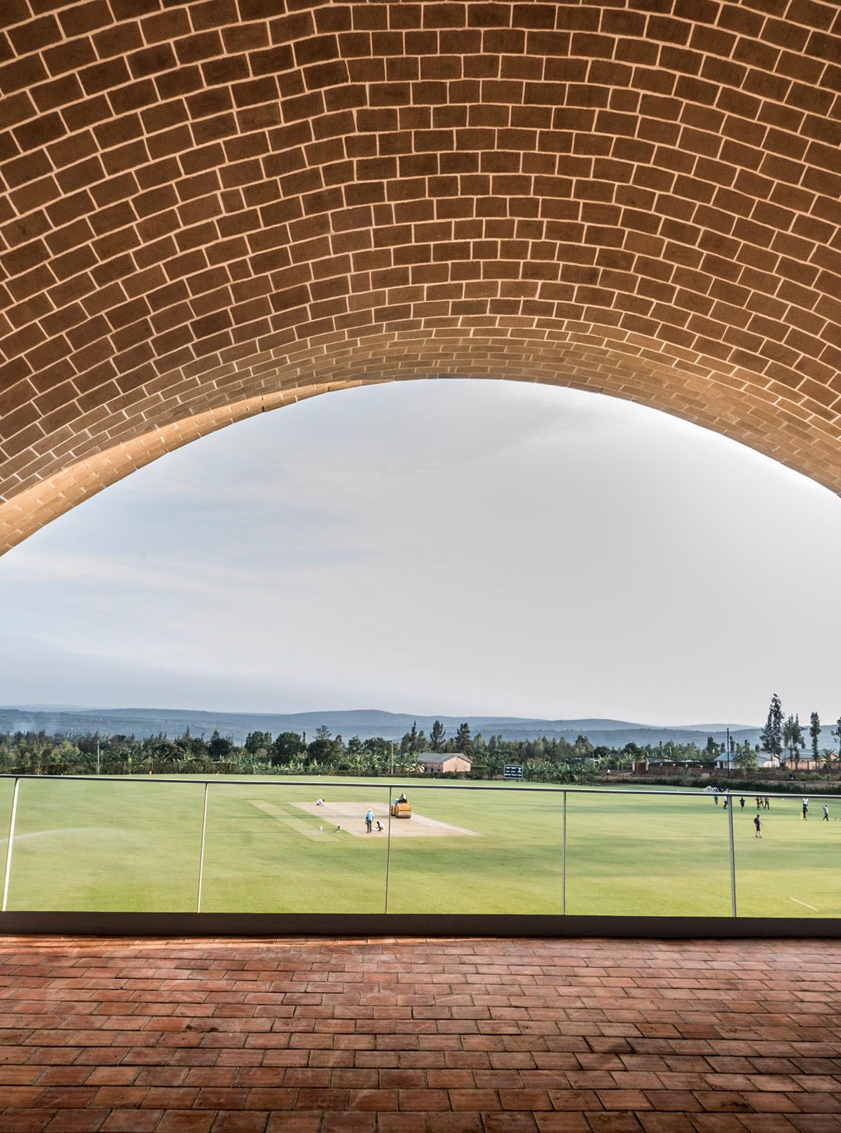 Light Earth Designs' parabolic Cricket Stadium addresses to cherished hilly topography of Rwanda