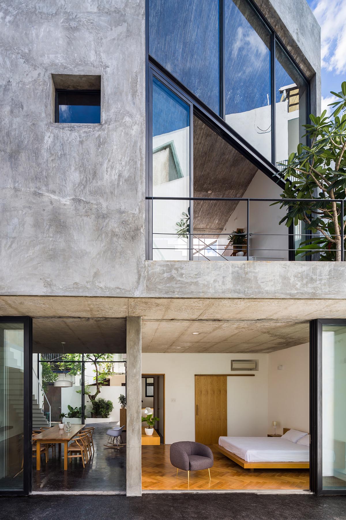 Sanuki Daisuke Architects' multifaceted concrete house features more open spaces in Vietnam