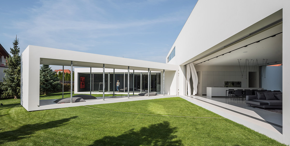 Movements of sun define the form of this protruding house designed by KWK Promes in Poland