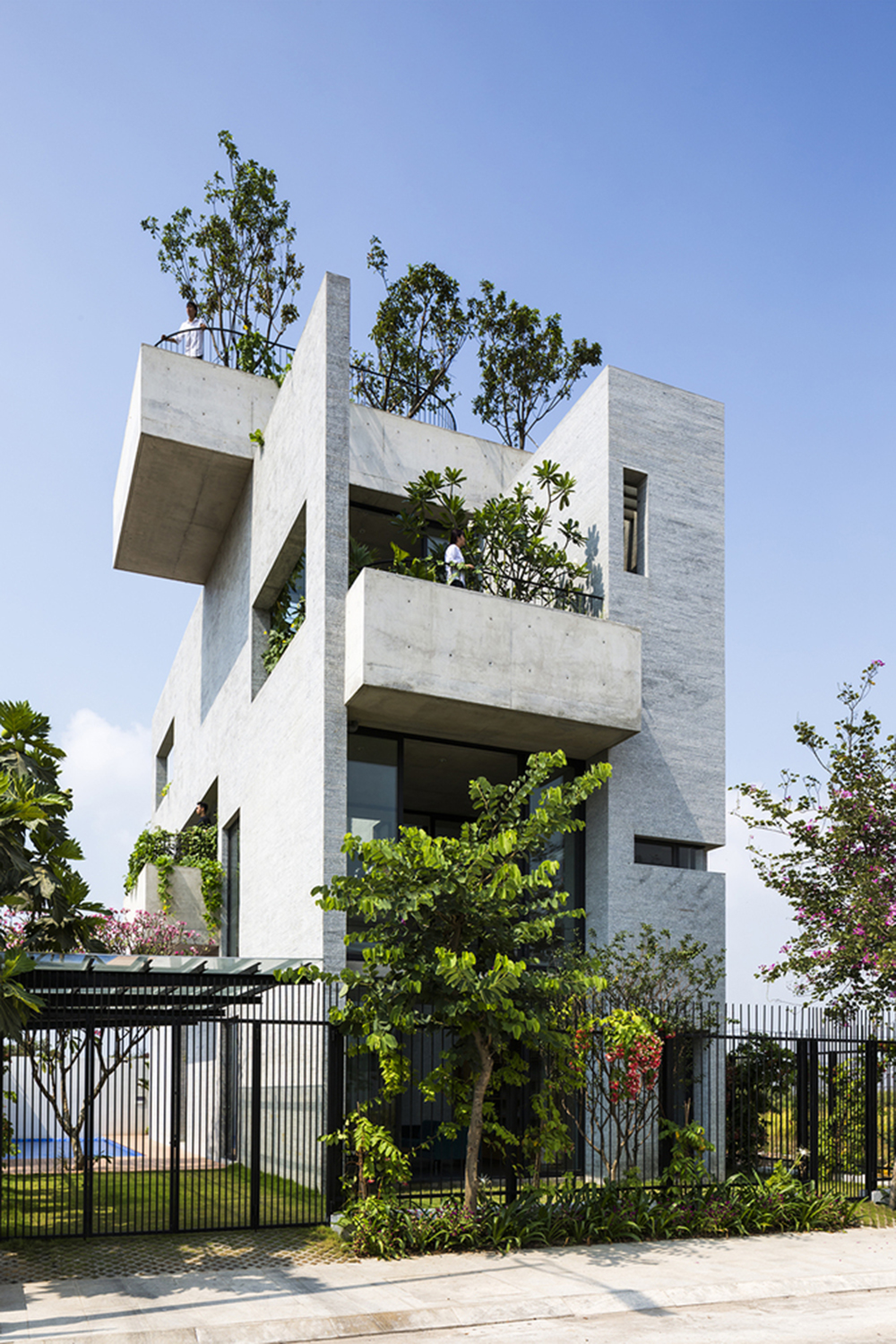 VTN Architects designed perforated house filled with gardens for Vietnam’s low density green spaces