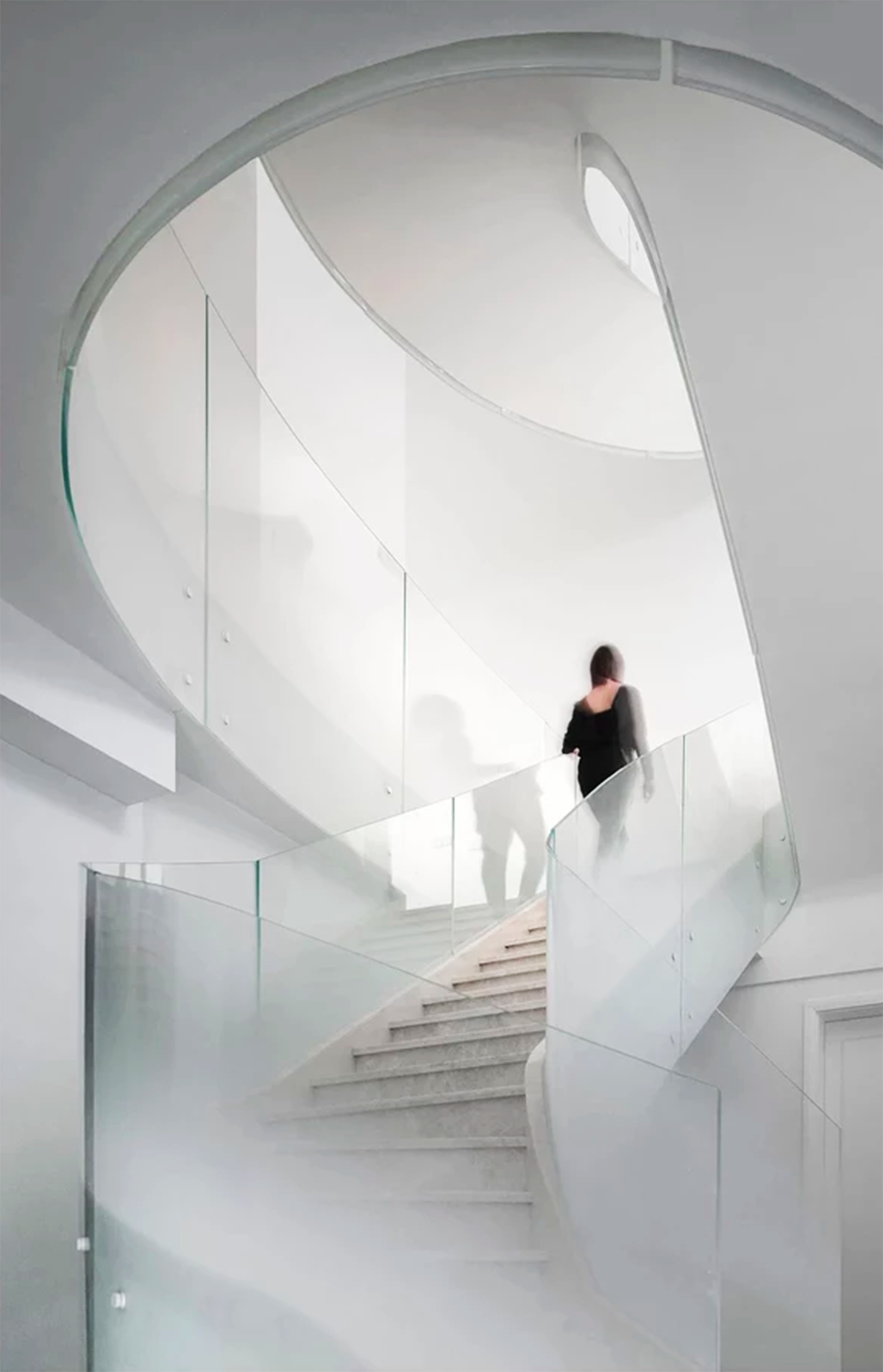 Grand spiral staircase dominates Cloud Villa in Shanghai by KOS Architects