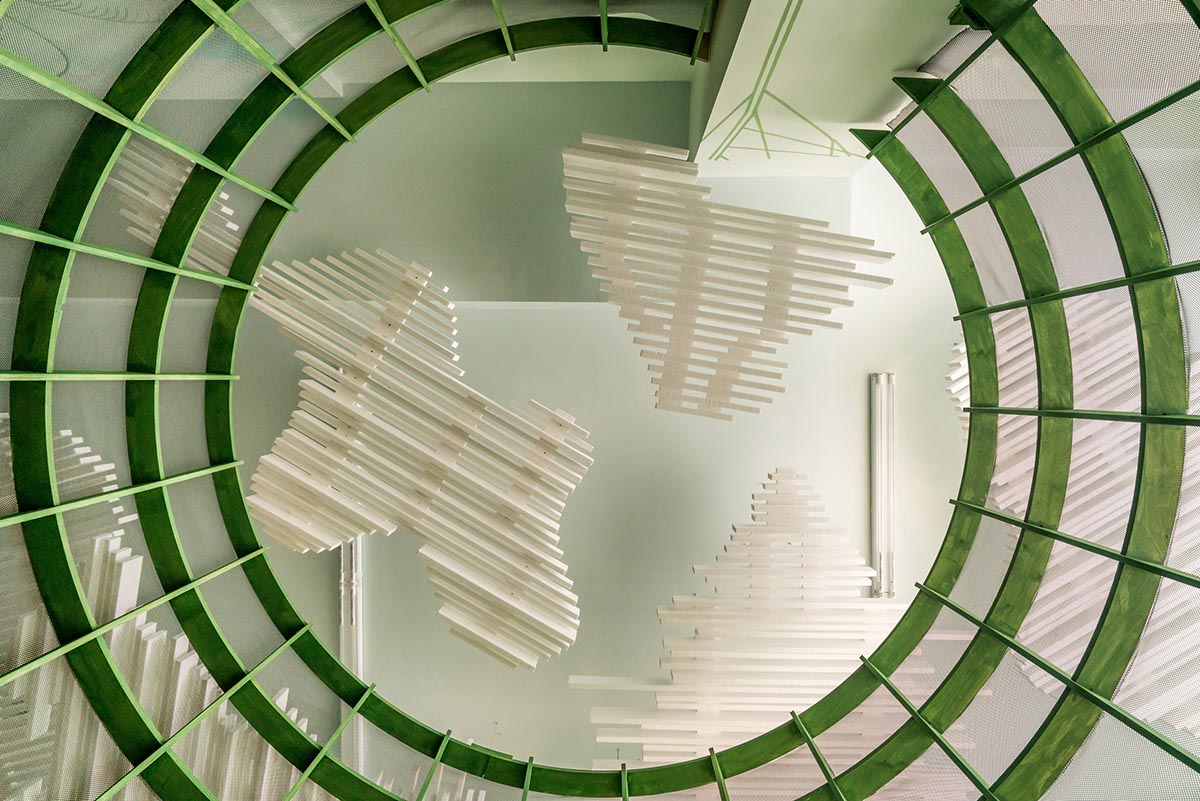 Architensions uses abstract elements of nature for children's playground made of plywood structures