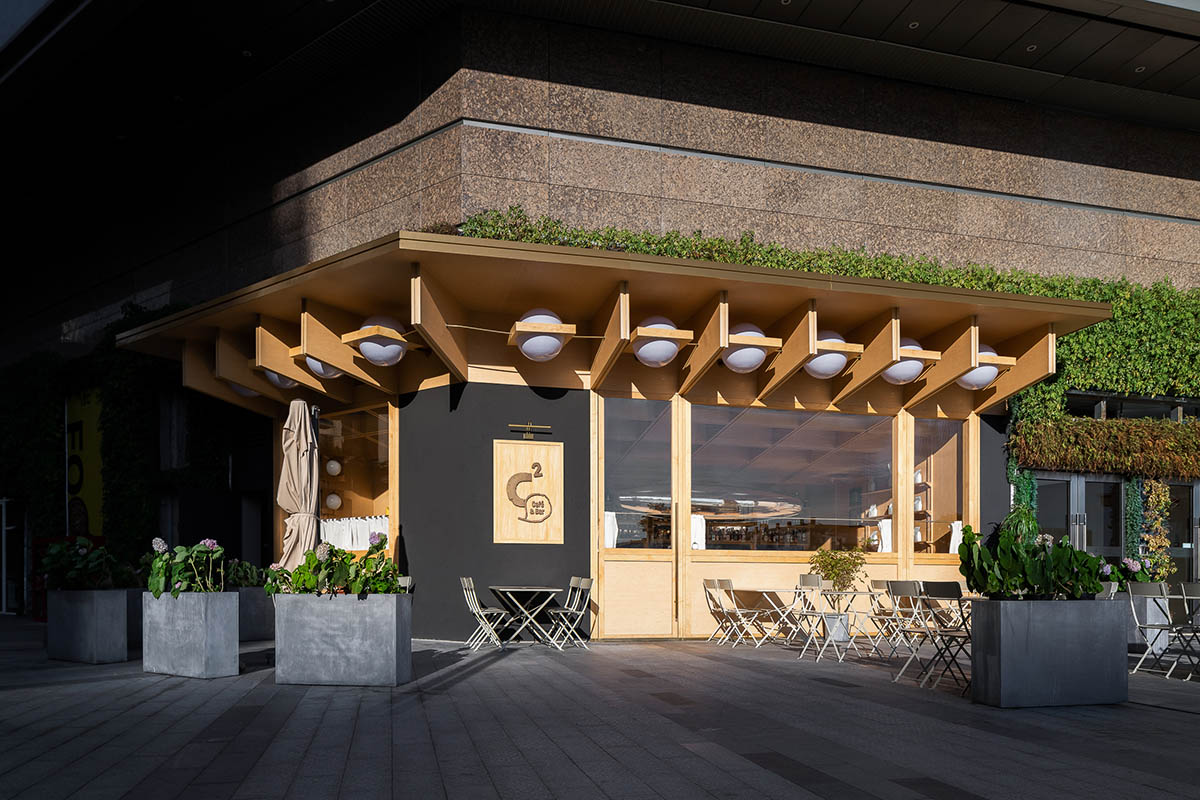 Various Associates completes C² Cafe & Bar in Shenzhen with wooden ceiling details