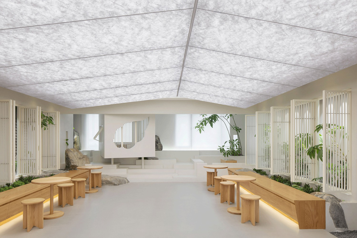 Jiejie studio wraps this tea room with a peach garden with rocky and forest landscape in Beijing