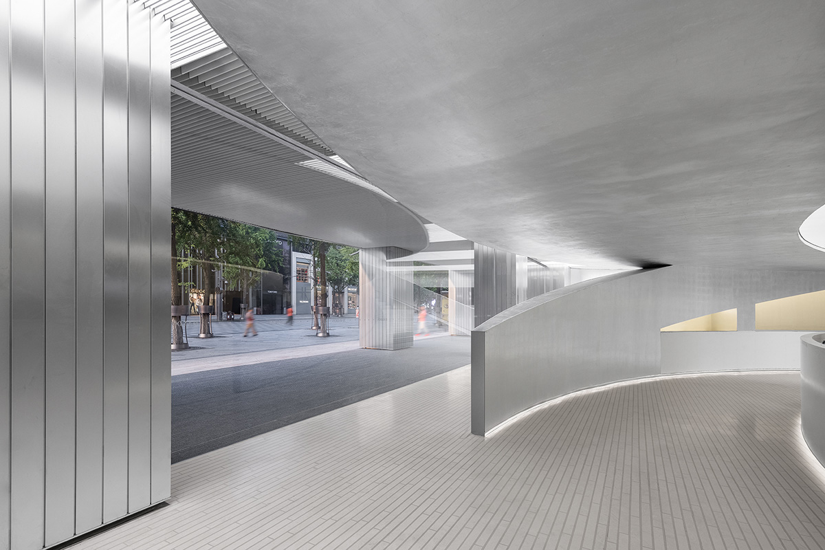 Various Associates designs beauty store with winding staircase and silver-toned interiors in Hangzhou