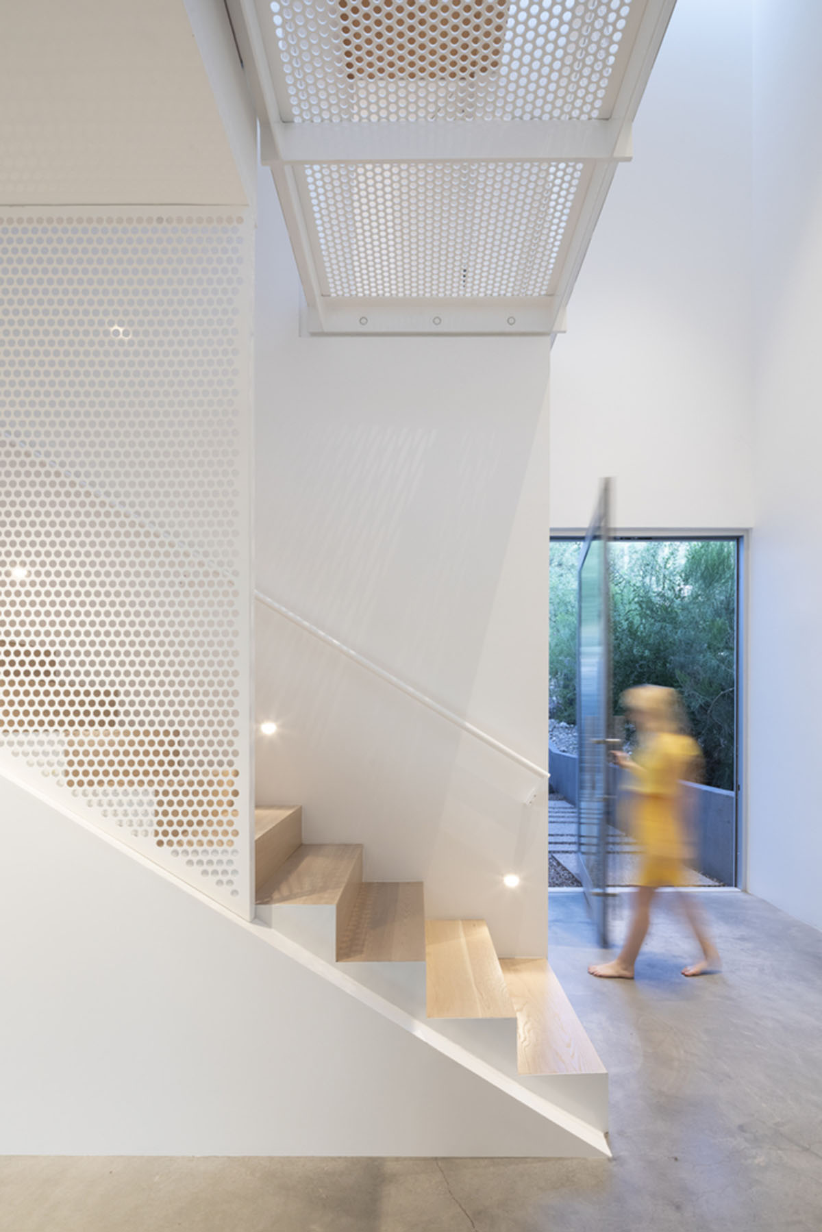 HK Associates Inc frames desert oasis with Ventana House featuring geometric protrudings in Tucson