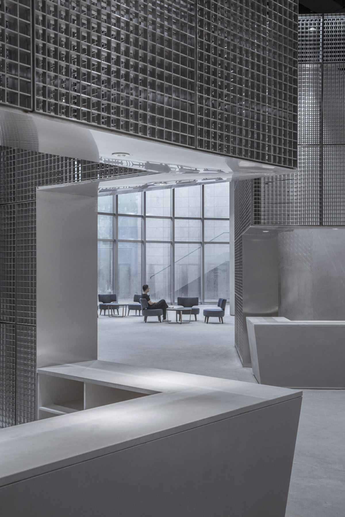 BANDe Architects combines greyscale interior with gridded wooden structures for GreenMonster Lab