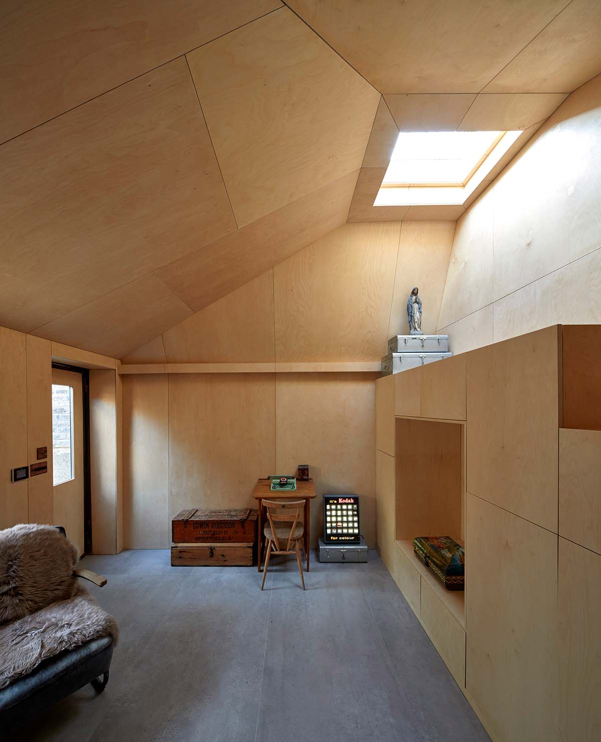 RISE Design Studio built sunken garden studio with rusted steel to provide a hidden place to escape