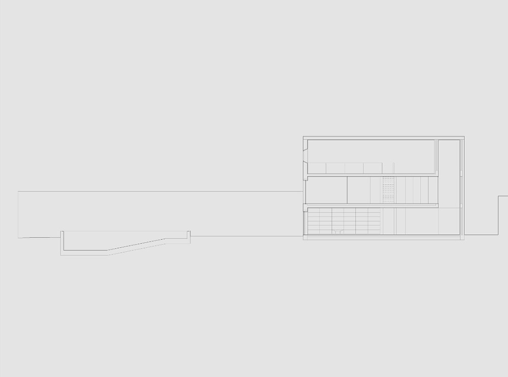 Extrastudio converted former winery in Portugal  into a new family home with red mortar walls