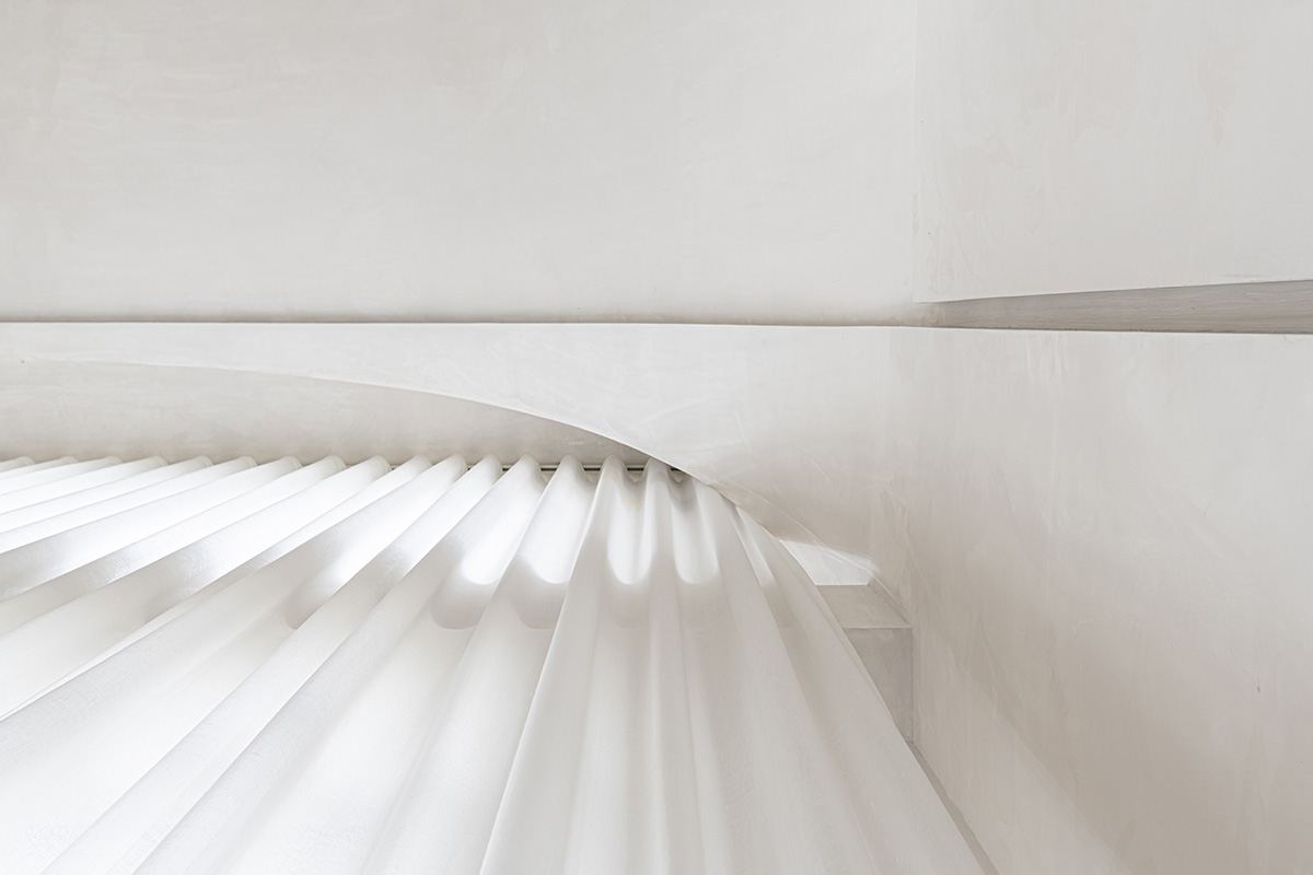EVD designs its office that features classical aesthetics with arched elements in Shanghai