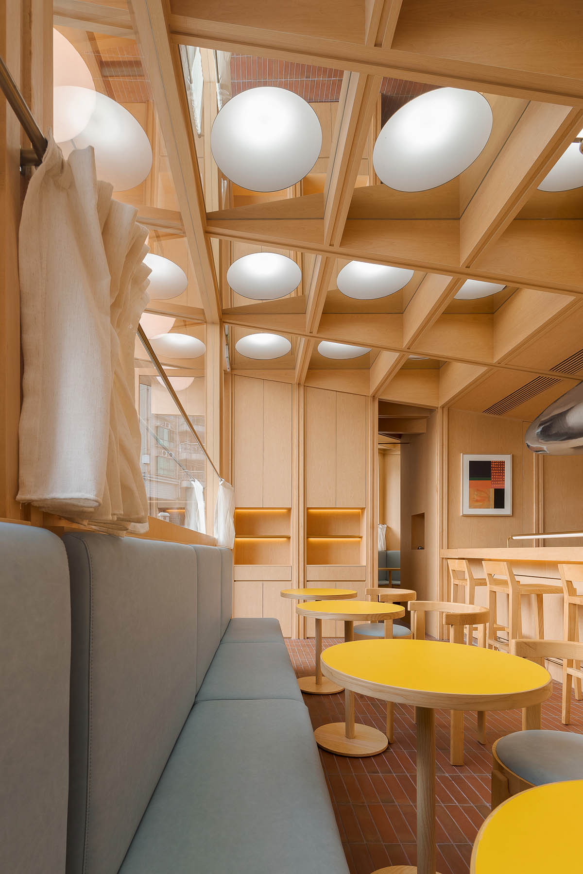 Various Associates completes C² Cafe & Bar in Shenzhen with wooden ceiling details