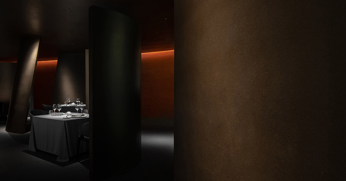 AD ARCHITECTURE designs restaurant with dark and cozy interiors in Shenzhen