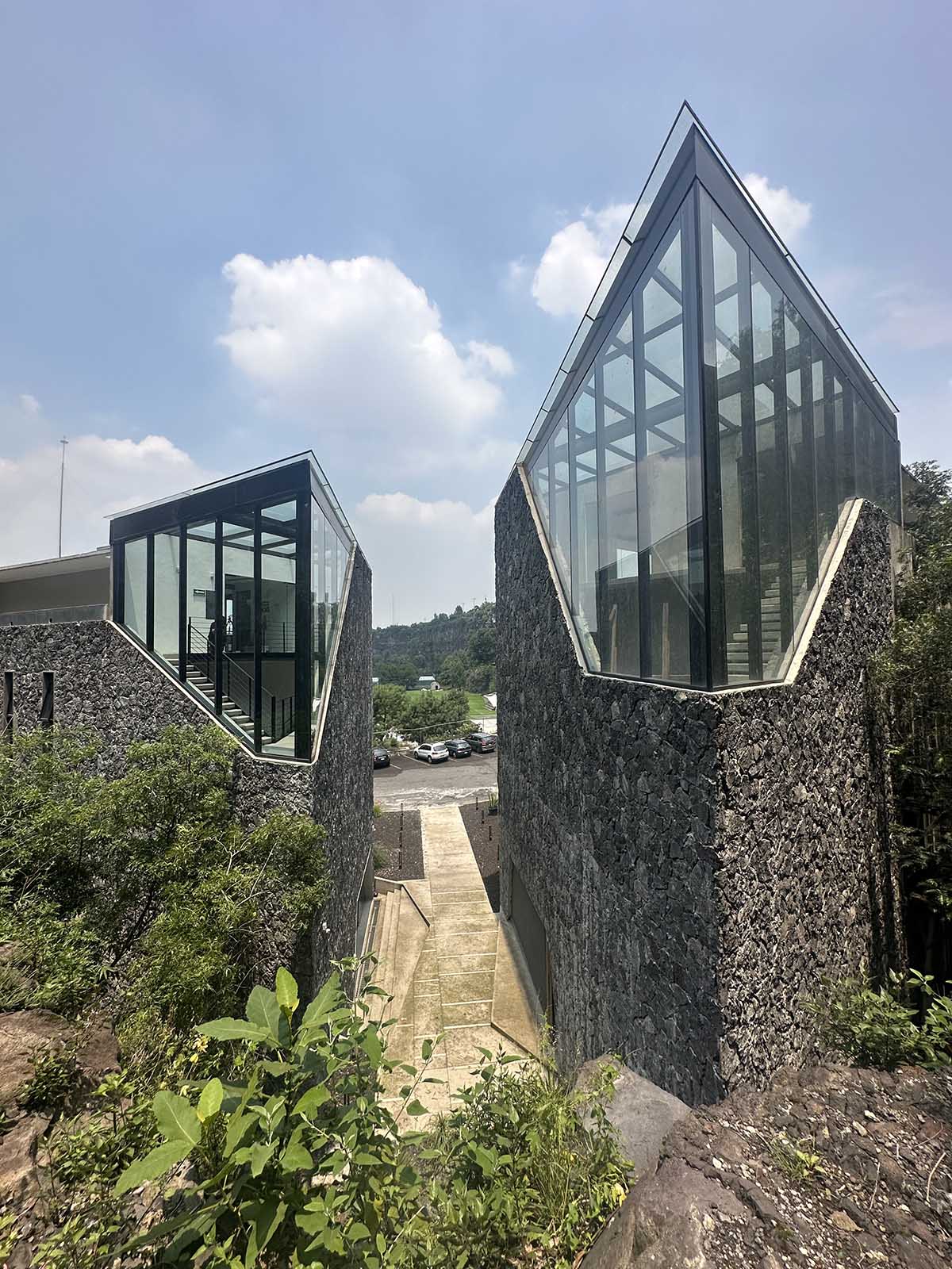 DF Arquitectos completes Pumas Clubhouse from volcanic stone in Mexico