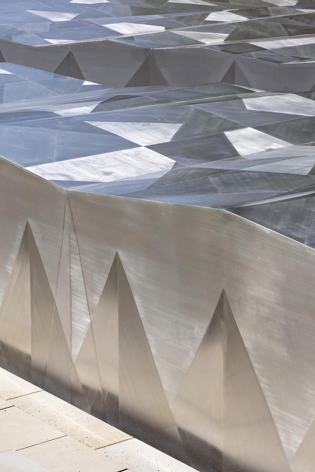 Snøhetta designs subterranean museum extension glistening in landscape for Ordrupgaard Museum