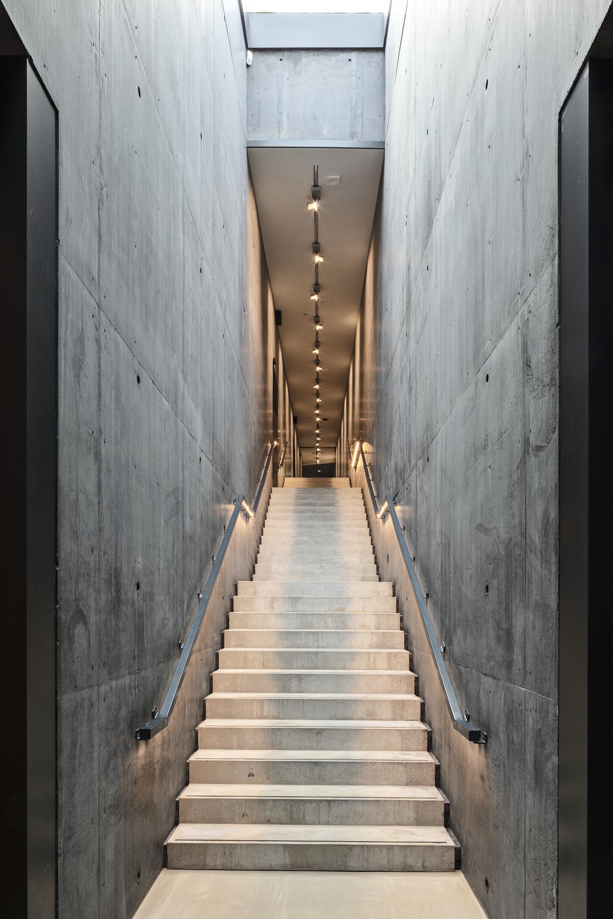 Snøhetta designs subterranean museum extension glistening in landscape for Ordrupgaard Museum