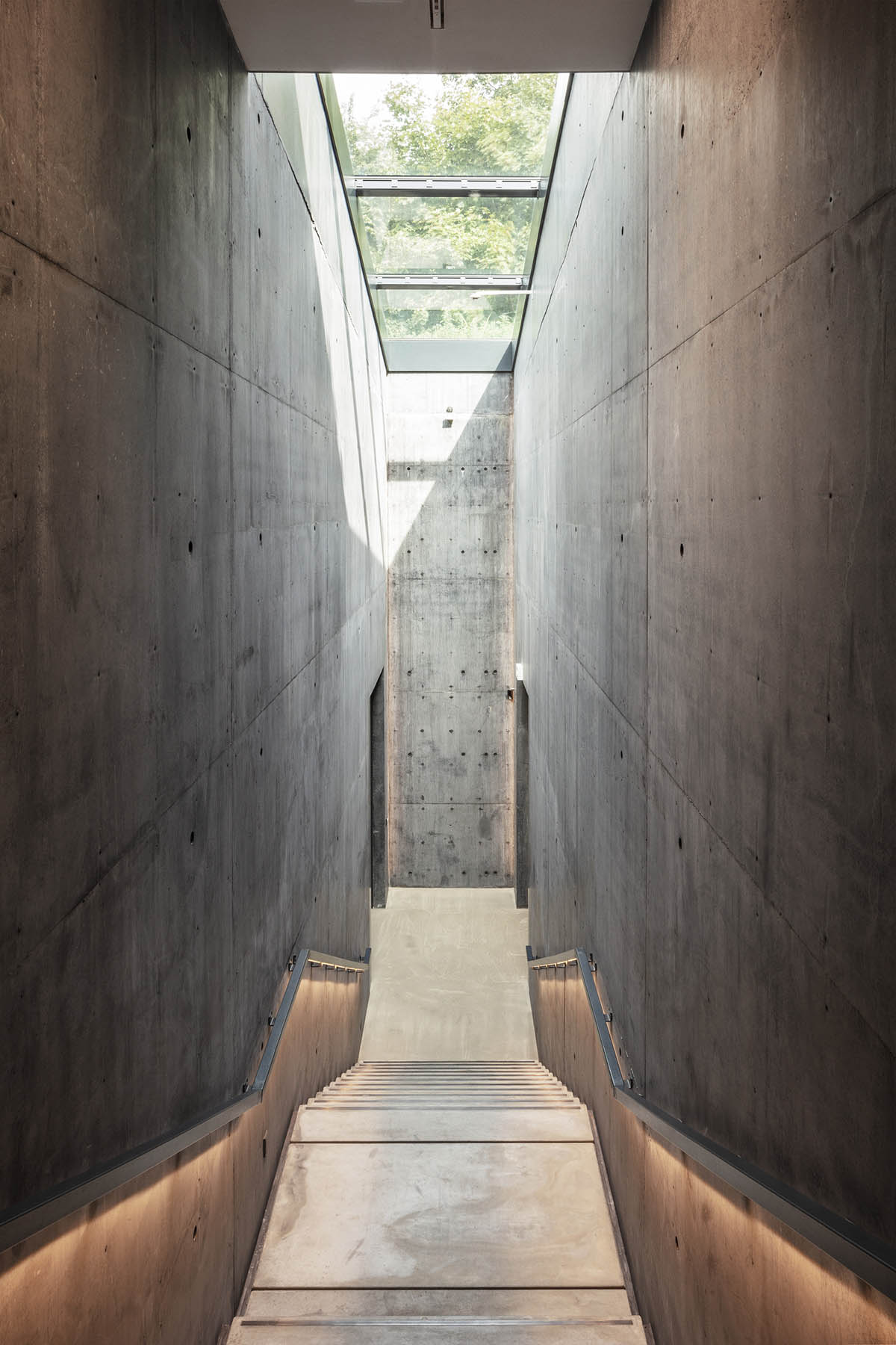 Snøhetta designs subterranean museum extension glistening in landscape for Ordrupgaard Museum