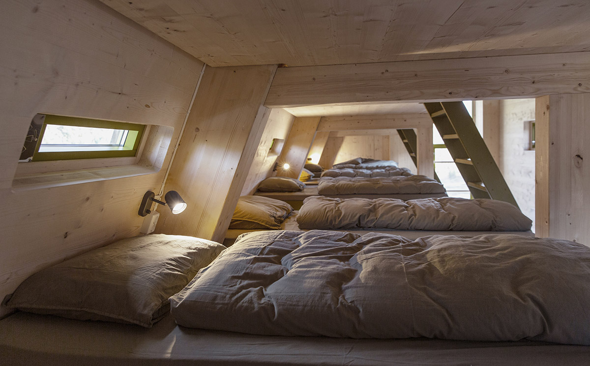 Snøhetta built pentagonal and oblique wooden cabins for hikers on the mountains of Luster