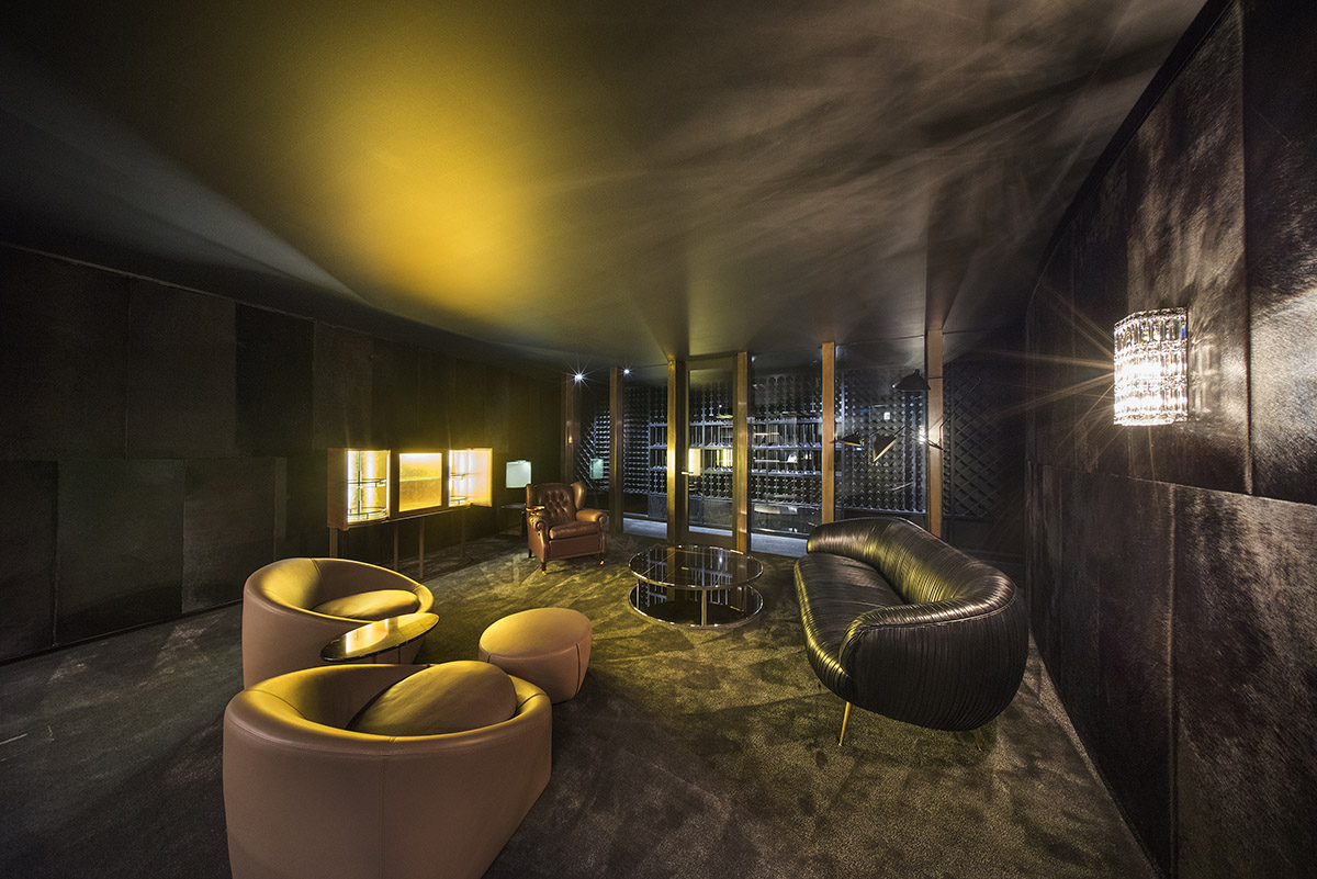 Wood Marsh built sculptural Towers Road House that features disc-shaped zinc roof in Toorak