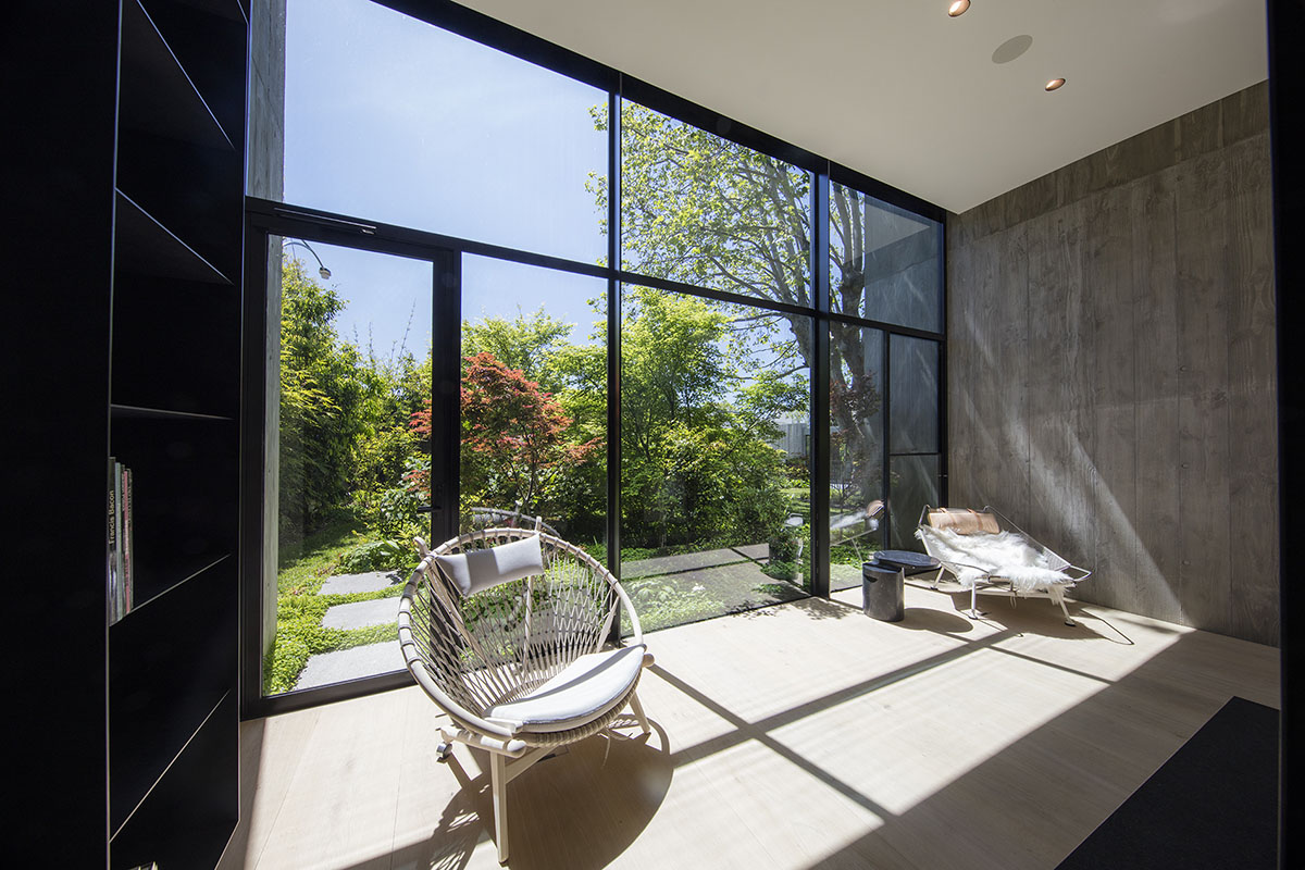 Wood Marsh built sculptural Towers Road House that features disc-shaped zinc roof in Toorak