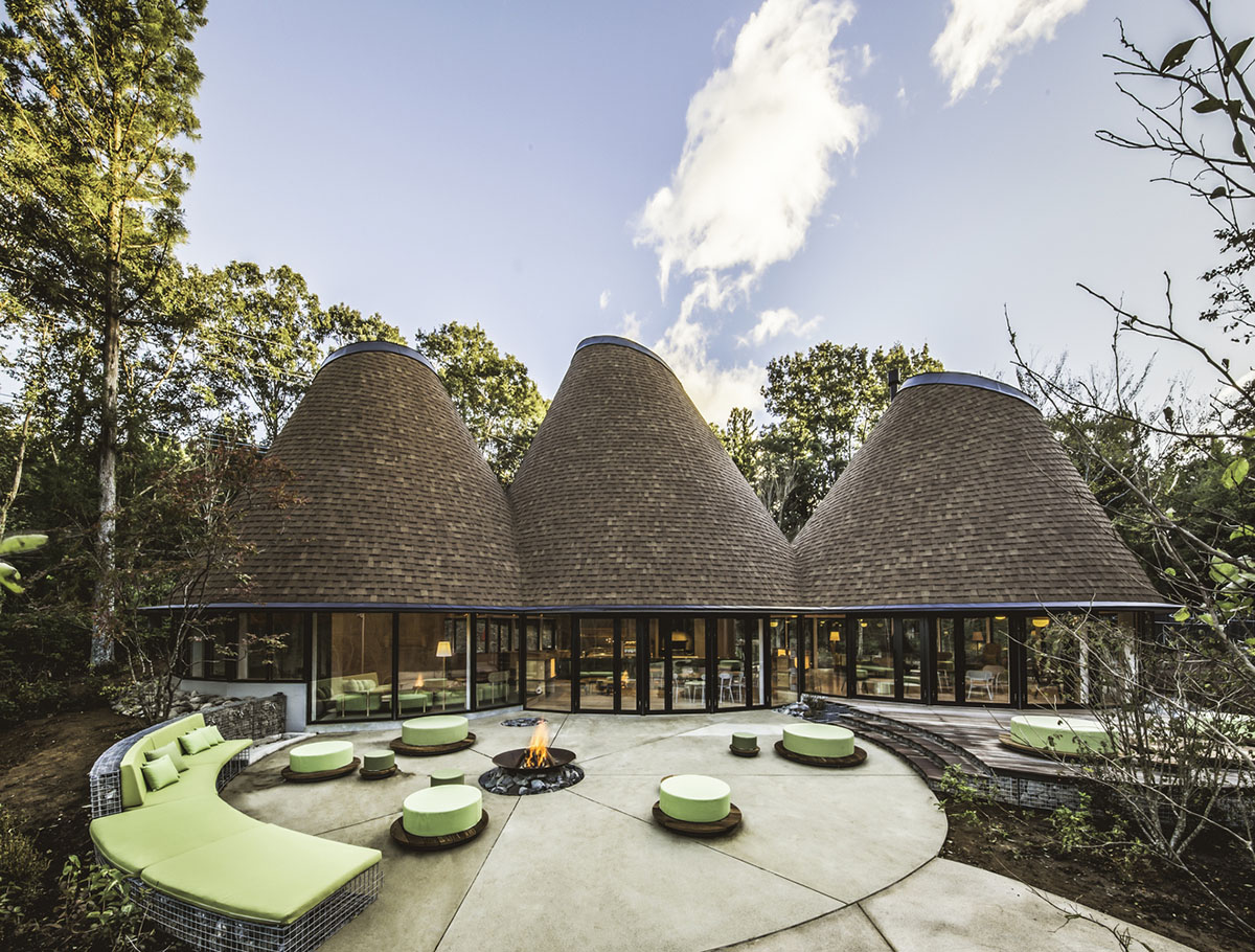 This club house by Klein Dytham Architecture offers serene atmosphere within lush forest in Japan