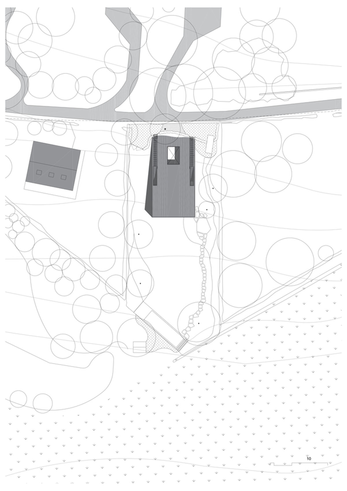 Studio Okami Architects built brick private villa embedded in the slope to offer infinite views