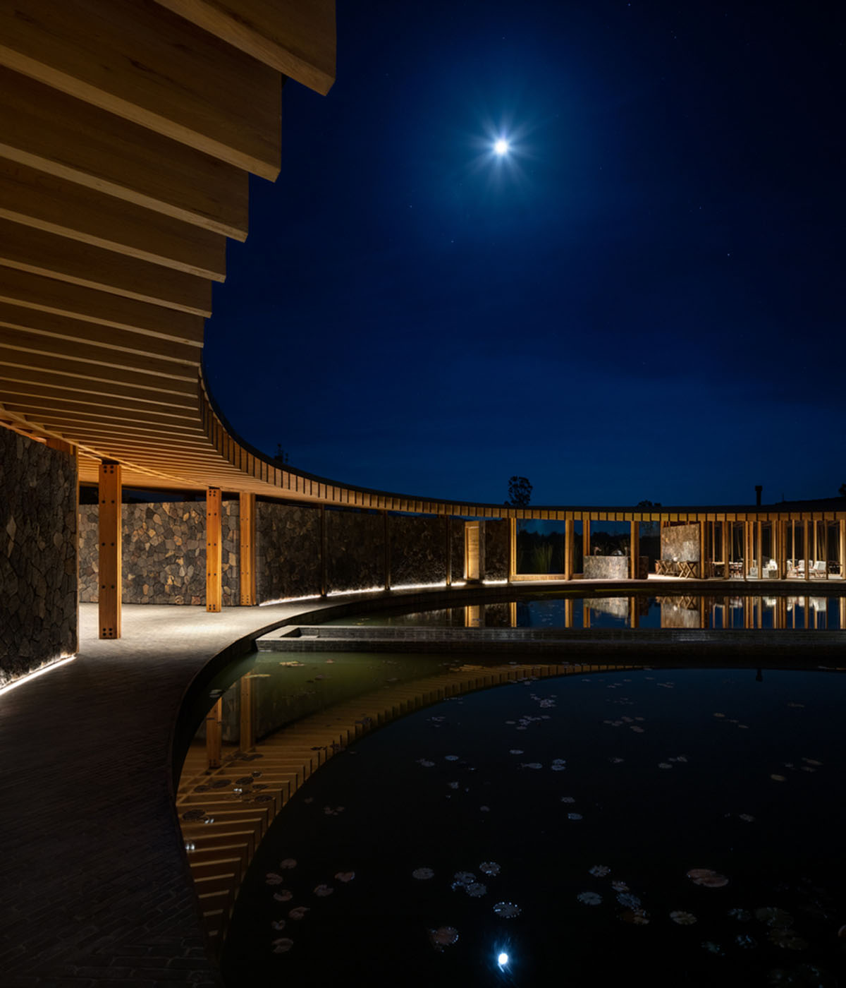 Circular clubhouse by Sordo Madaleno Arquitectos is nestled on the edge of lake in Valle de Bravo