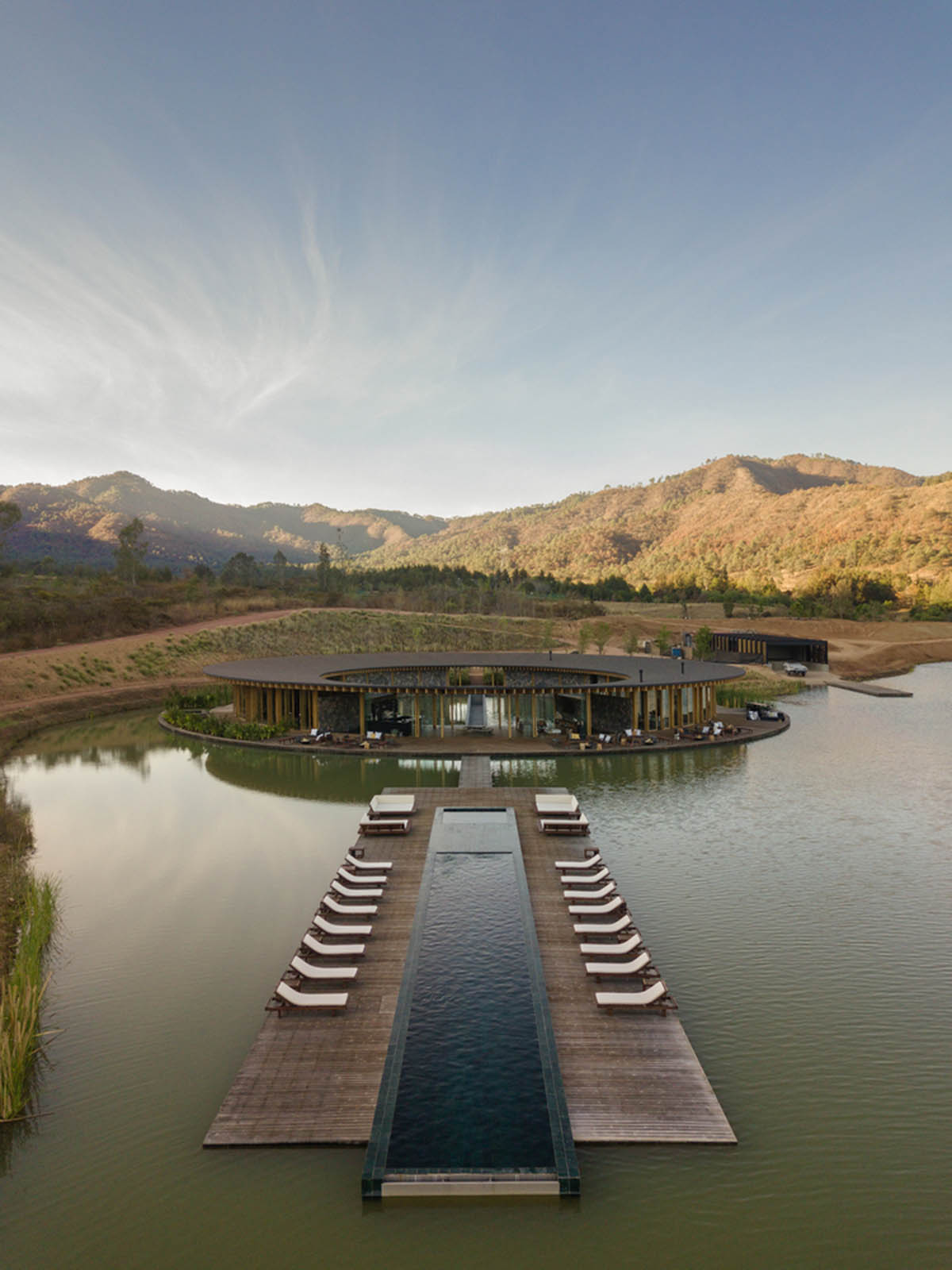 Circular clubhouse by Sordo Madaleno Arquitectos is nestled on the edge of lake in Valle de Bravo