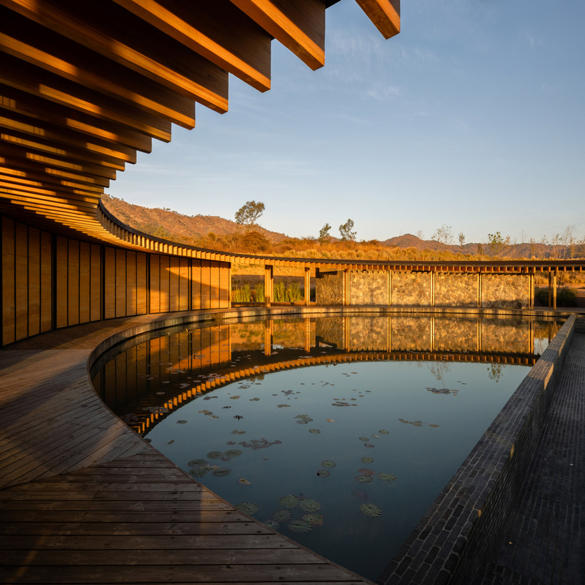 Circular clubhouse by Sordo Madaleno Arquitectos is nestled on the edge of lake in Valle de Bravo
