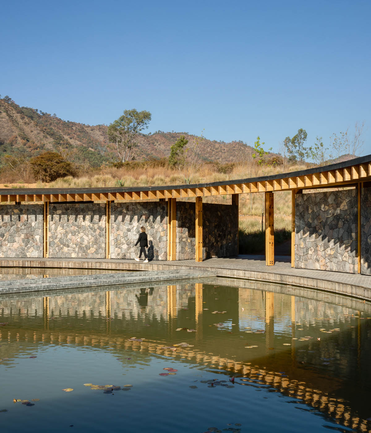 Circular clubhouse by Sordo Madaleno Arquitectos is nestled on the edge of lake in Valle de Bravo