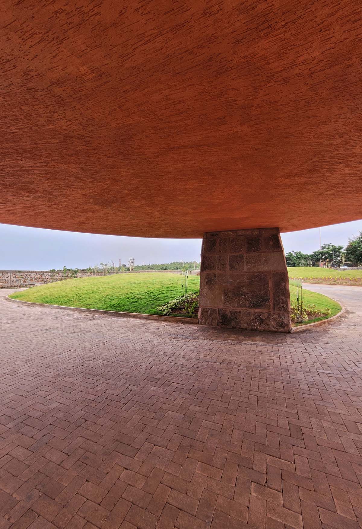 sP+a completes India's new arts centre, Hampi Art Labs, with sinuous concrete volume