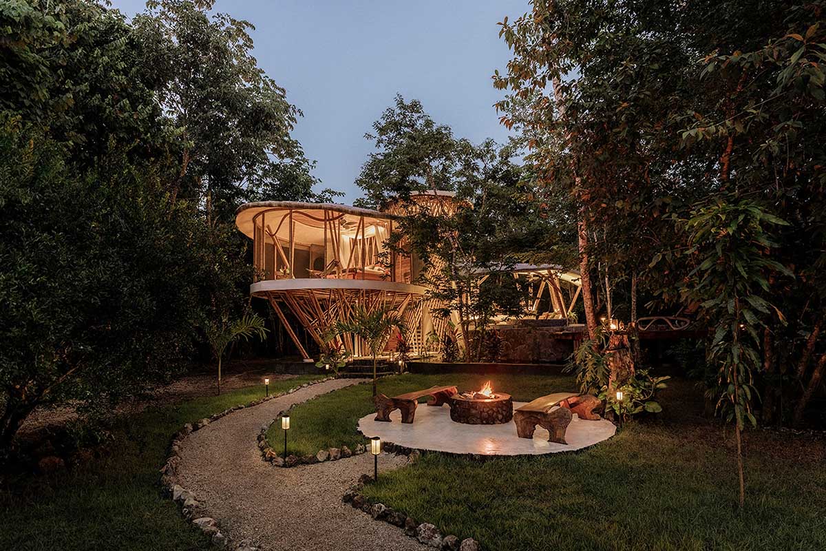 Flower-shaped bamboo holiday villa by NOD Studio is encased in a bamboo dome in a Mexican jungle