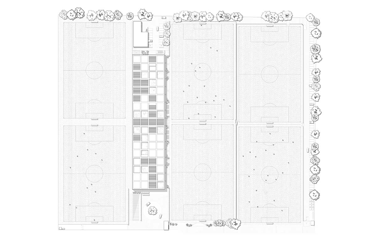 Red pigmented gridded structure defines village-like Mexican sport facility by Sordo Madaleno