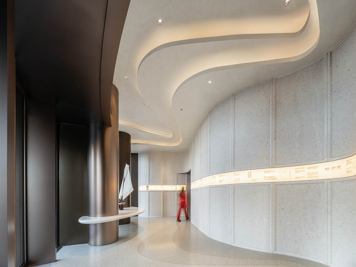 Undulating lines and expansive waves define interior of Orbit public exhibition hall in Shanghai 