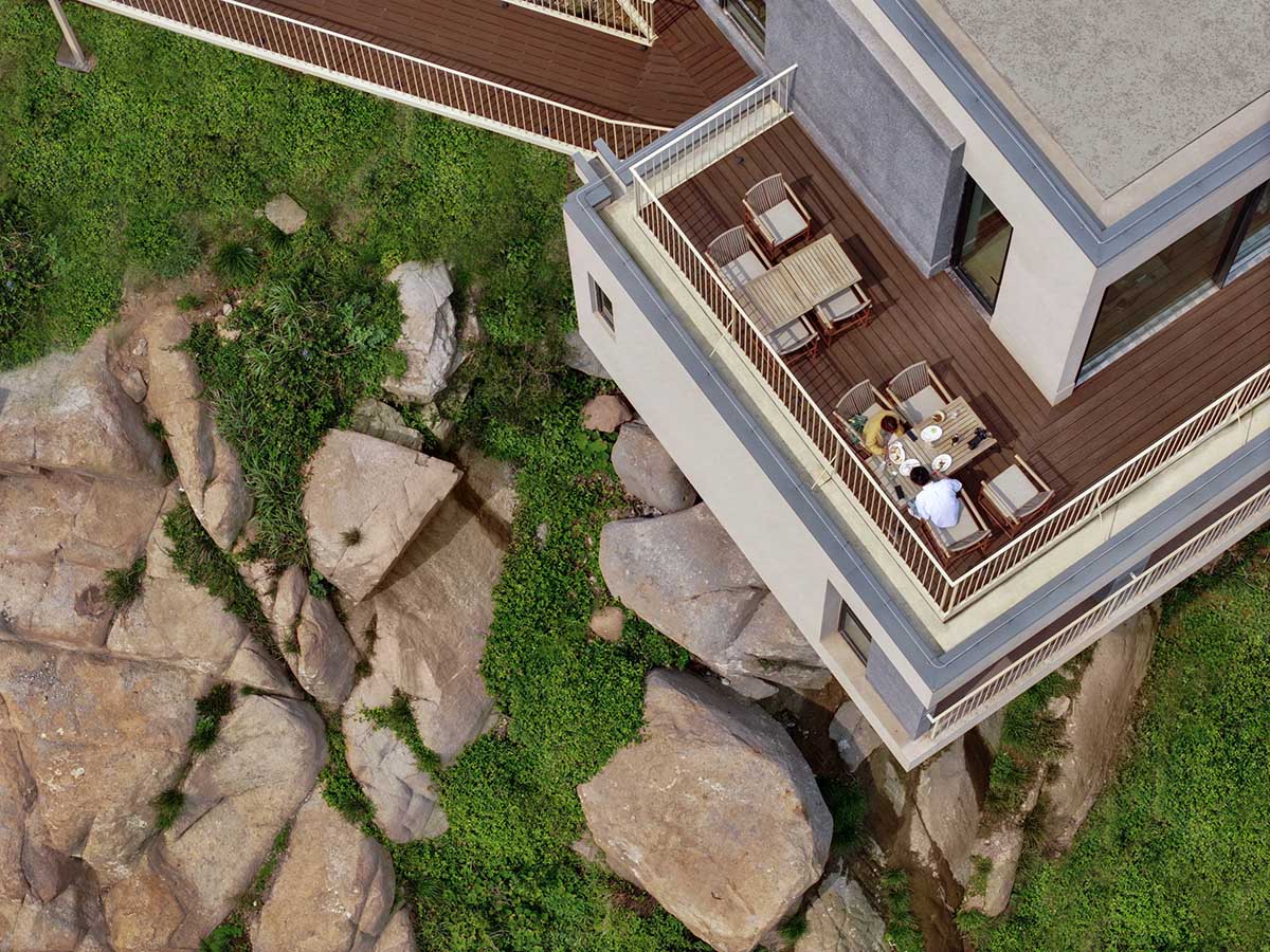 The Lighthouse Hotel reinterprets traditional fishing village settlements on a steep reef in Zhoushan