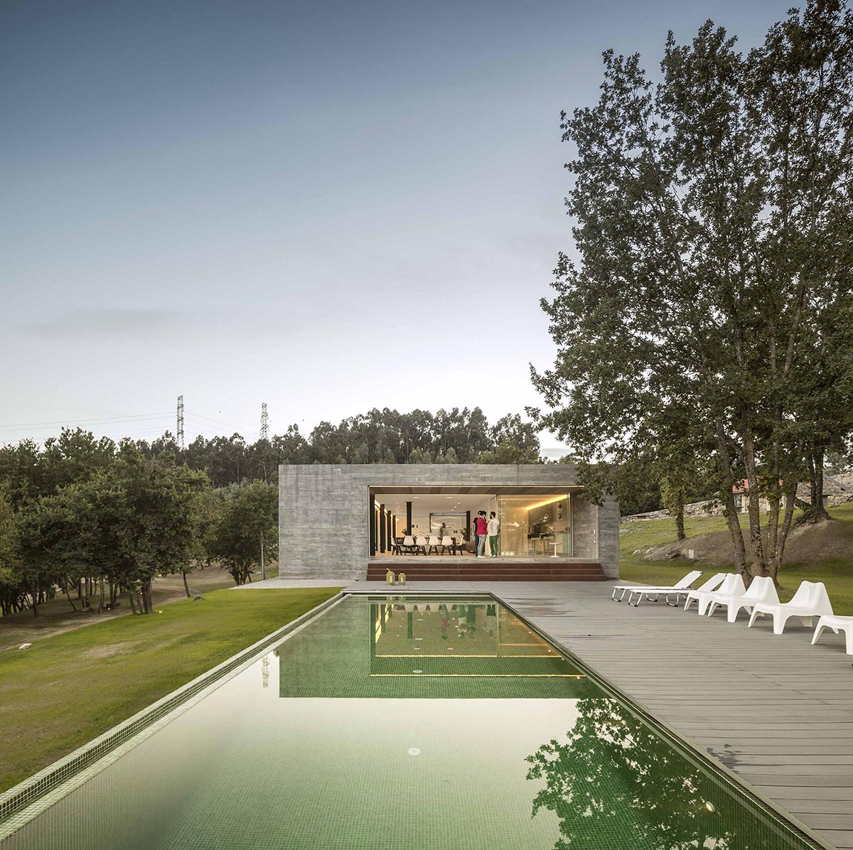 An elongated Sambade house by Spaceworkers presents itself as sober urban landmark in Portugal