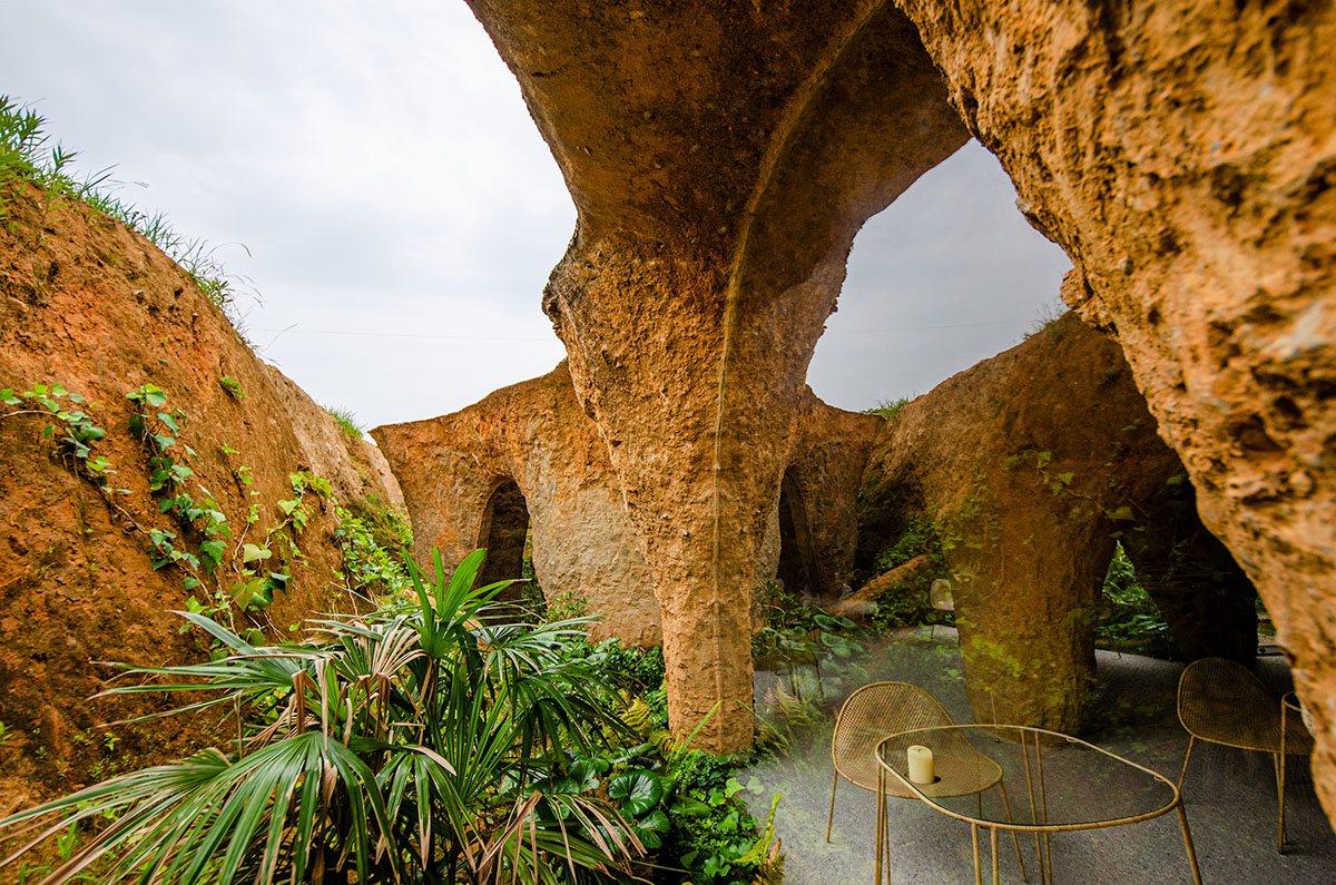 Junya.Ishigami+Associates reveals cave-like house and restaurant in earth form in Japan 