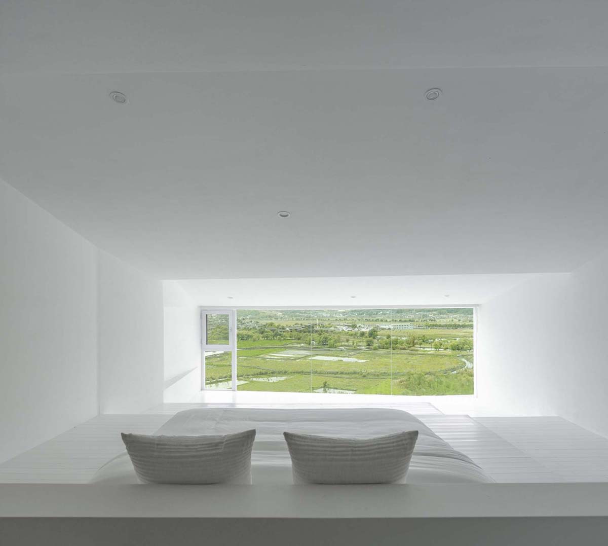 STUDIO QI reinterprets sequence of living conditions with tilted hotel on a hilly plot in China