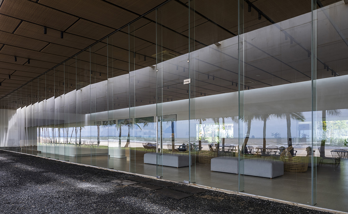 Six landscape boxes form this gallery and showroom by MIA Design Studio in Vietnam